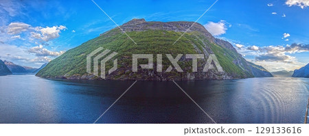 geirangerfjord reflective fjord mountain panorama geirangerfjord reflective fjord mountain panorama 129133616