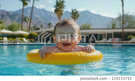Joyful baby swimming Joyful baby swimming 129133732