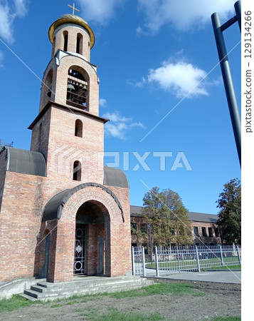 church and bell tower, Beslan School, city monument to victims of terrorism, North Ossetia, Russia church and bell tower, Beslan School, city monument to victims of terrorism, North Ossetia, Russia 129134266