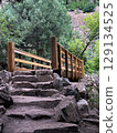 Rustic Wooden Bridge on Forest Hiking Trail 129134525