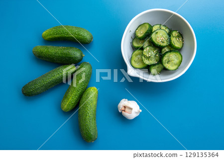 Fresh cucumber salad with dill and sesame seeds. 129135364