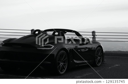 Glossy black open car 129135745