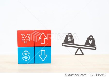 Business image showing exchange rate fluctuations of the strong yen and weak dollar Business image showing exchange rate fluctuations of the strong yen and weak dollar 129135952