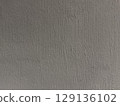 Close-up of a gray textured wall 129136102