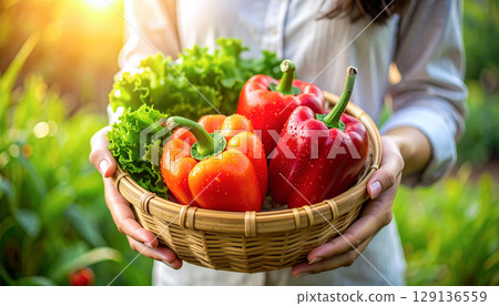 Women with summer vegetables 129136559