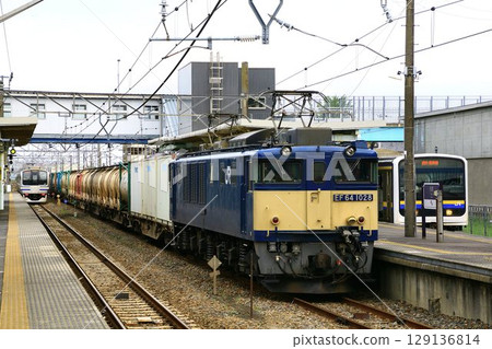 Container freight train pulled by EF64-1000 electric locomotive Container freight train pulled by EF64-1000 electric locomotive 129136814