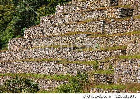 Stone walls of Machu Picchu ruins, Peru, South America 129136933