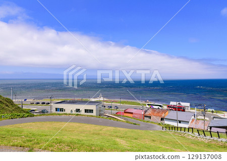 Coastal scenery of Cape Soya and Port Soya under the clear blue sky in June 129137008