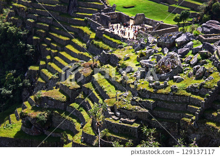 Stone walls of Machu Picchu ruins, Peru, South America 129137117