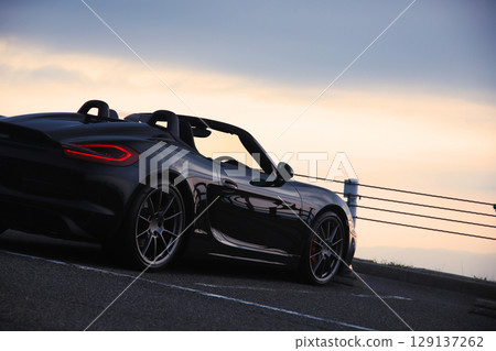 Glossy black open car Glossy black open car 129137262