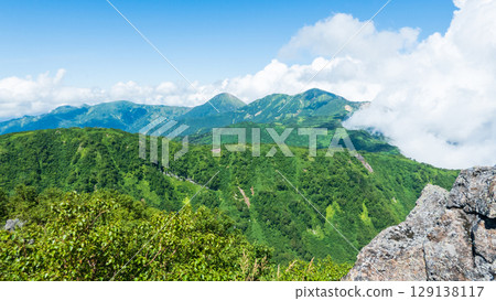 Climbing Mt. Myoko in summer (view of Mt. Yakeyama and Mt. Hiuchiyama from the top of the northern peak) Climbing Mt. Myoko in summer (view of Mt. Yakeyama and Mt. Hiuchiyama from the top of the northern peak) 129138117