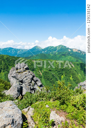 Climbing Mt. Myoko in summer (view of Mt. Yakeyama and Mt. Hiuchiyama from the top of the northern peak) Climbing Mt. Myoko in summer (view of Mt. Yakeyama and Mt. Hiuchiyama from the top of the northern peak) 129138142