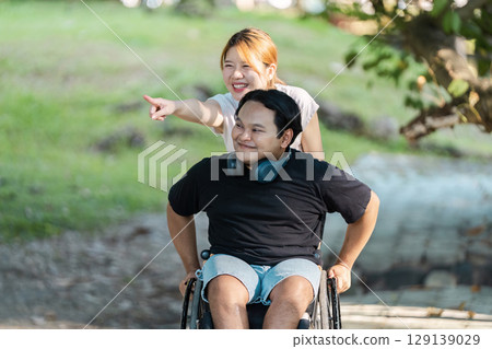 Joyful Friends Enjoying Outdoor Activities Together in a Park Setting Joyful Friends Enjoying Outdoor Activities Together in a Park Setting 129139029