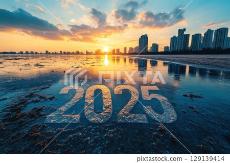 A city skyline with a large body of water in the background 129139414