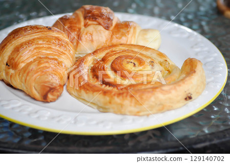 danish or danish pastry dish and croissant ,French croissant or French bread 129140702