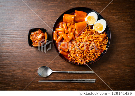 Korean instant noodles with Korean rice cake and fish cake and boiled egg 129141429