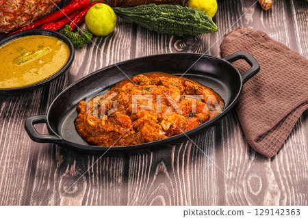 Indian cuisine - Prawns malabar masala 129142363
