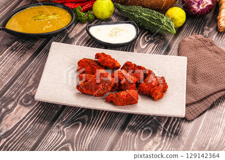 Indian cuisine - hot Fish Tikka 129142364