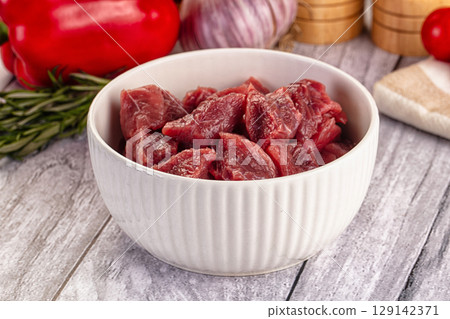 Raw beef meat cubes pieces 129142371