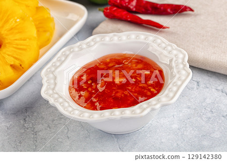Sweet and spicy chili pineapple sauce Sweet and spicy chili pineapple sauce 129142380