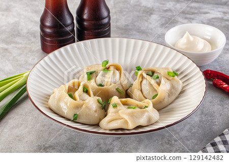 Uzbek cuisine - staffed Manti with meat 129142482