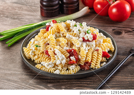Italian pasta fusili with curd Italian pasta fusili with curd 129142489