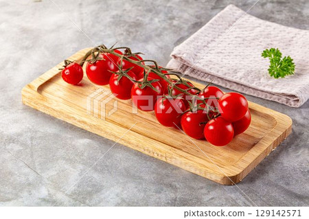 Ripe sweet cherry tomato branch 129142571