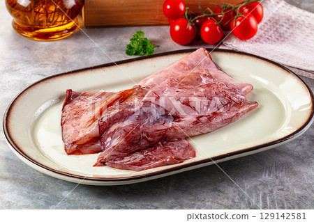 Raw fresh calamari for cooking 129142581