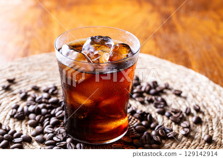 Iced coffee and coffee beans 129142914