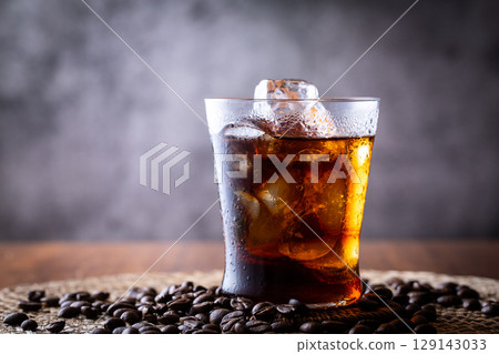 Iced coffee and coffee beans Iced coffee and coffee beans 129143033