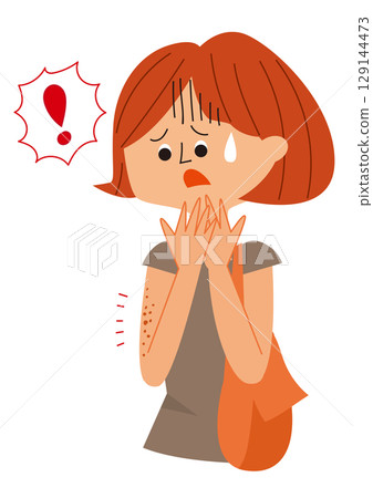 Woman surprised by spots on her arm 129144473