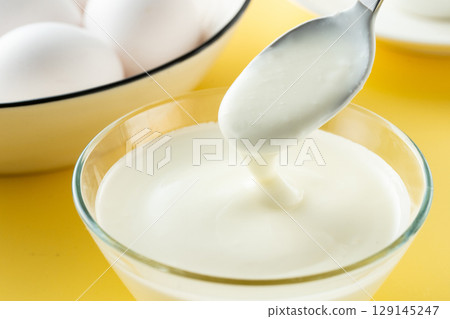 Eat yoghurt 129145247