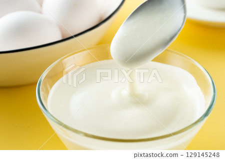 Eat yoghurt 129145248