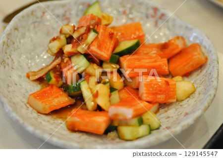 imitation crab salad, crab stick salad or cucumber salad or spicy salad imitation crab salad, crab stick salad or cucumber salad or spicy salad 129145547
