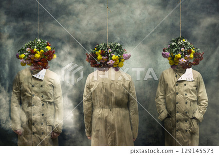 Three men in raincoats with hanging bouquets of flowers. "Where the dream ends." 129145573