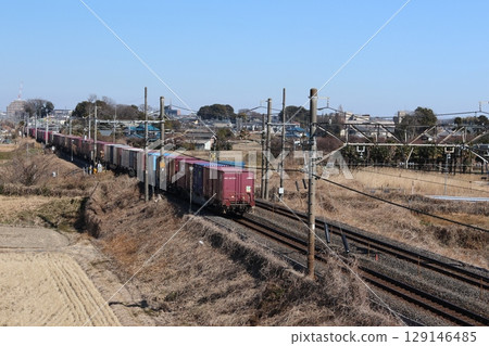 A container freight train pulled by EH500 running on the Utsunomiya Line 129146485