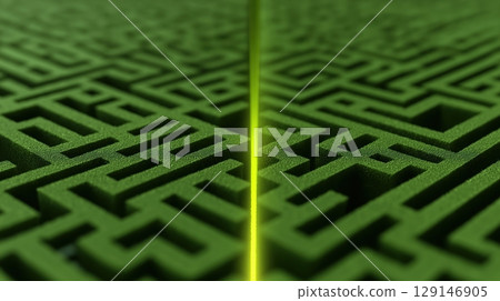 Intricate green maze design with a glowing divide in the center. 129146905