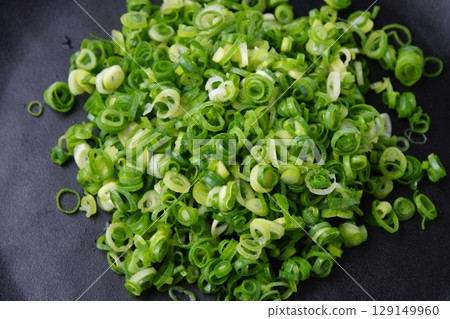 chopped green onions chopped green onions 129149960