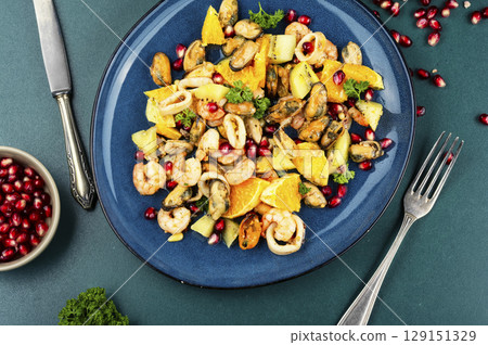 Seafood salad with orange. Seafood salad with orange. 129151329