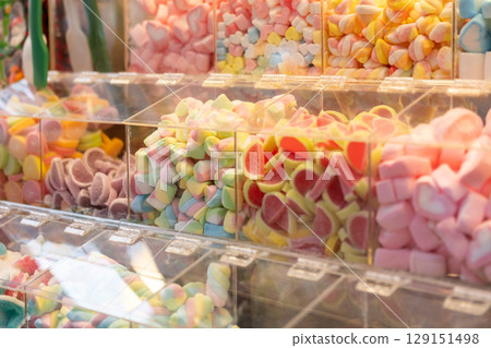 Selection of marshmallow, jelly, gummy and other sweets in the market 129151498