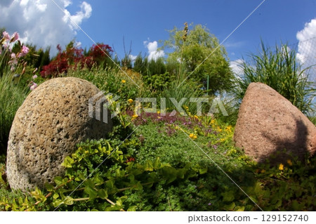 A Colorful and Beautiful Garden Landscape Featuring Unique and EyeCatching Rock Features A Colorful and Beautiful Garden Landscape Featuring Unique and EyeCatching Rock Features 129152740