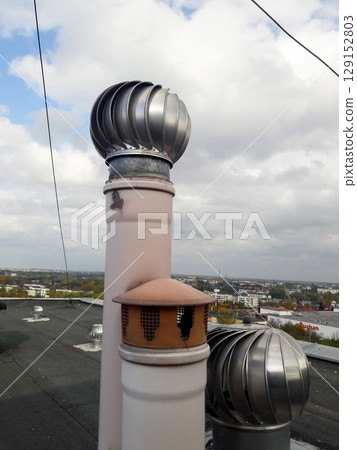 Discover Unique Rooftop Vents and Chimneys Enhanced with Innovative Wind Turbines Discover Unique Rooftop Vents and Chimneys Enhanced with Innovative Wind Turbines 129152803