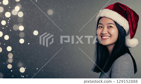 Beautiful asian woman, cosmetology, beauty, festive makeup, Merry Christmas and Happy New Year, banner with copy space 129152888