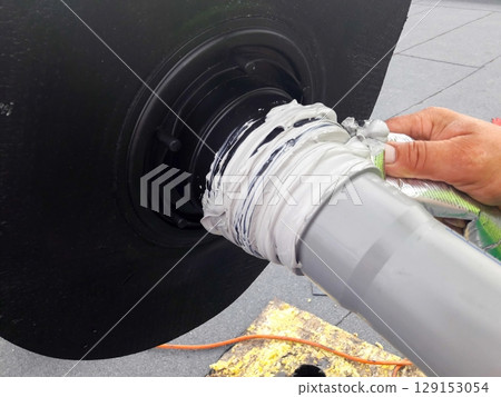 A detailed closeup view showcasing the connection of equipment on a technical installation 129153054