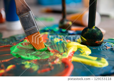 The Colorful Art Creation Process Involves Using a Brush and Various Paint Techniques The Colorful Art Creation Process Involves Using a Brush and Various Paint Techniques 129153118