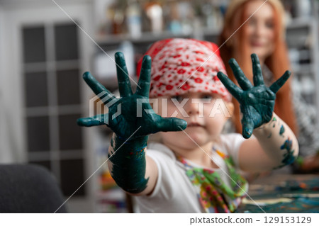 Join us for a delightful Creative Kids Art Session featuring vibrant and colorful paints 129153129