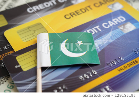 Pakistan flag on credit card, finance economy trading shopping online business. Pakistan flag on credit card, finance economy trading shopping online business. 129153195