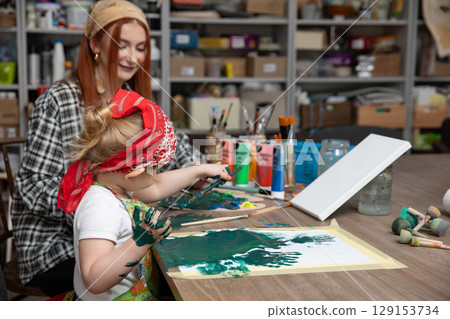 Engaging in a Creative Bonding Activity Art Session Between an Adult and a Child Engaging in a Creative Bonding Activity Art Session Between an Adult and a Child 129153734