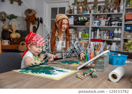 Creative Bonding Experience Mother and Child Enjoy Creating Art Together in Harmony 129153762