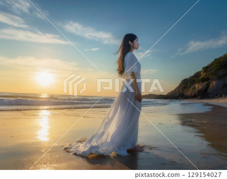 Woman rising into the sunset 129154027